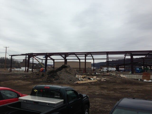 Vehicles parked in  front of unfinished vehicle - Constructions in New Castle, PA s