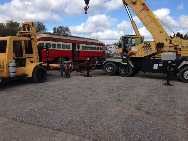 Lear Vehicles and Red Trolley Car - Constructions in New Castle, PA