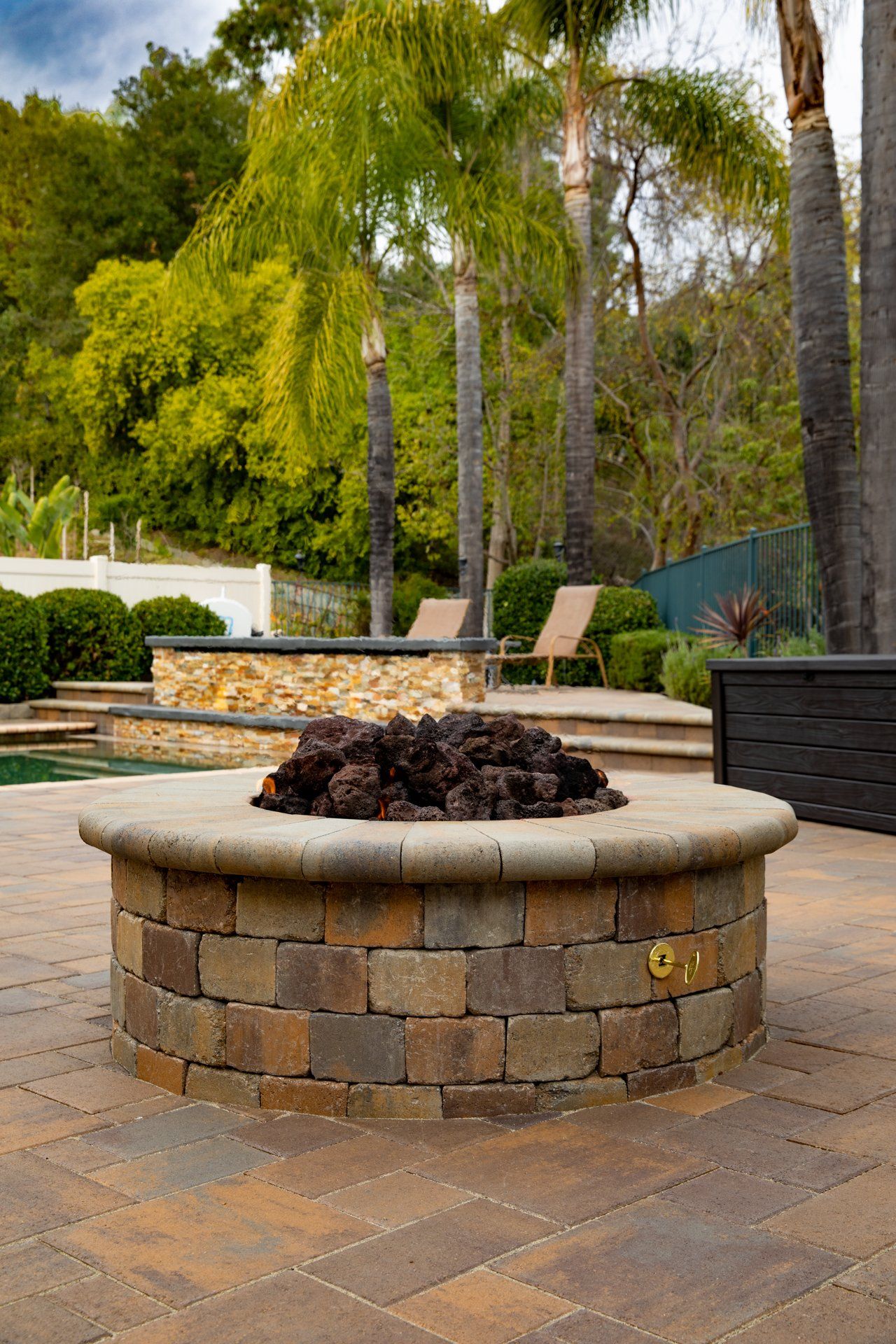 river rock outscape firepits & fireplaces