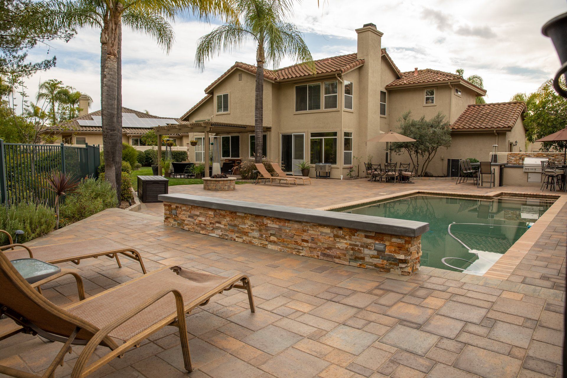 river rock outscape pool decks