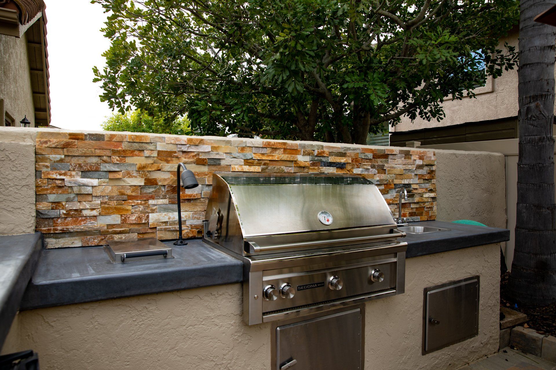river rock outscape bbq grills