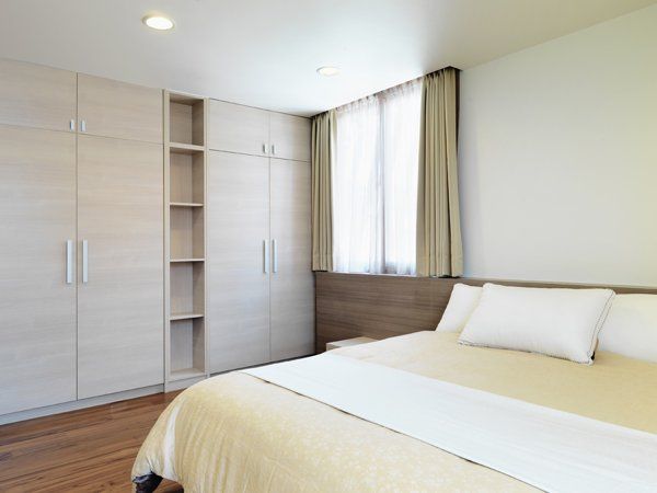 Minimalism bedroom with built in cabinets