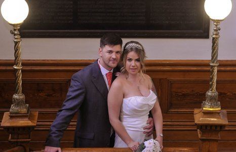A couple posing for a photo