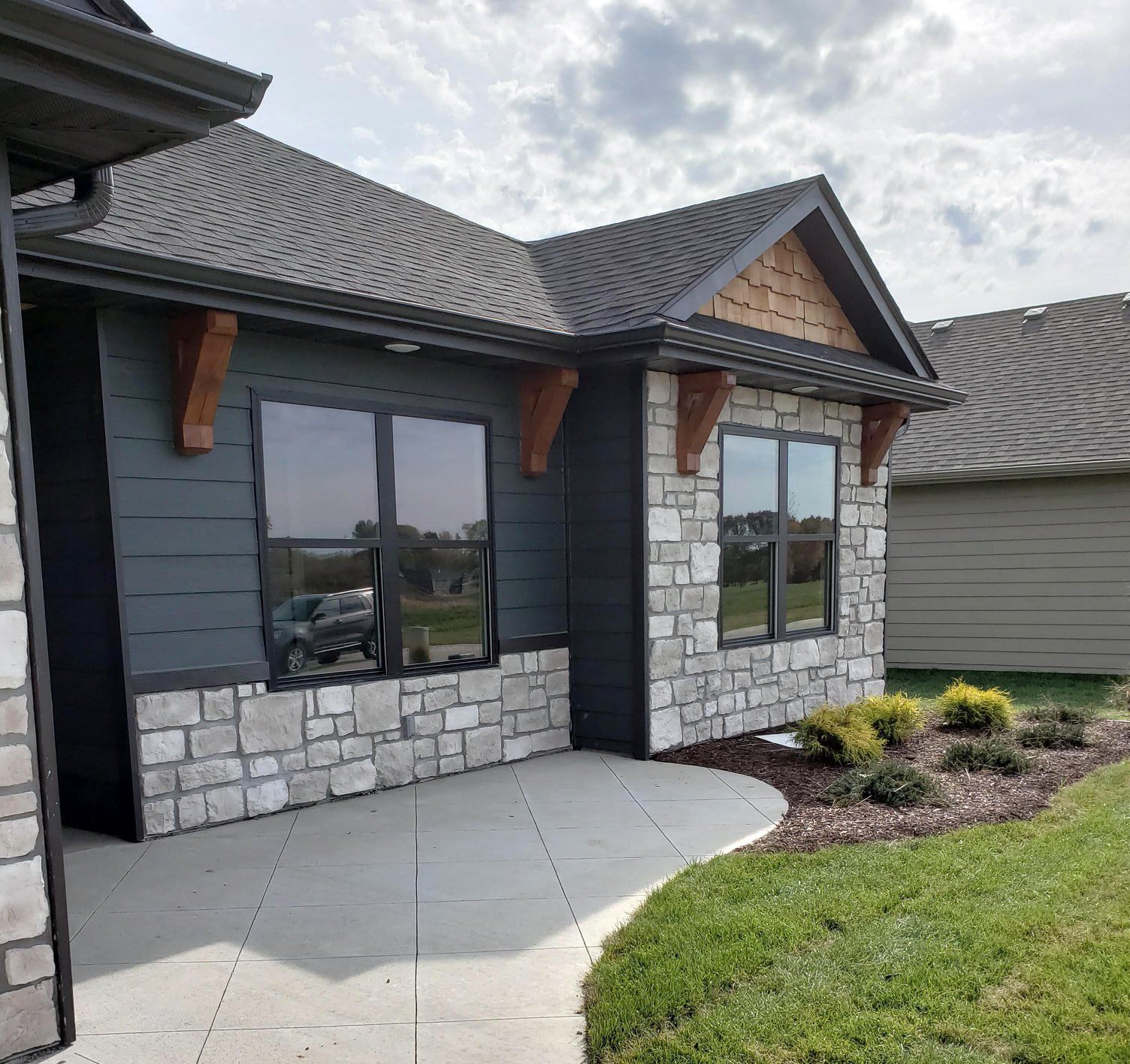 Timberwood Homes Custom Home with Sidewalk