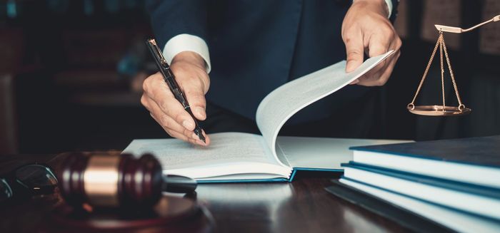 Lawyer — Lawyer Writing on Book in Marion, MS Lawyer — Lawyer Writing on Book in Marion, MS