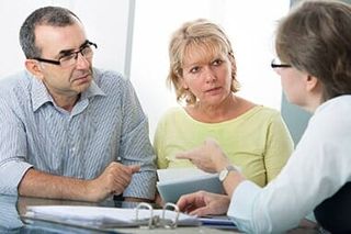 Accountant Discussing Tax Plans — S & S Tax And Financial Services, Inc. in Linden, NJ Accountant Discussing Tax Plans — S & S Tax And Financial Services, Inc. in Linden, NJ