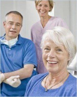 Dentist with His Assistant and Patient — Appointment in Yakima, WA