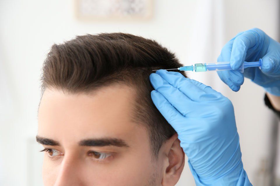 men hair restoration in progress