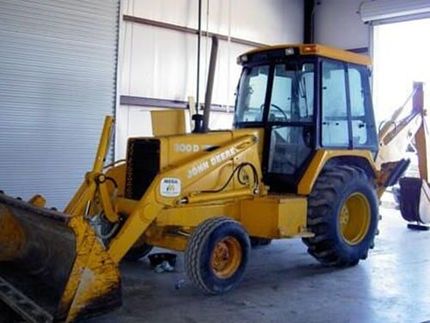 Backhoe in Open Area — Servicing Equipment in Fort Worth, TX