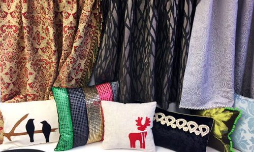 Assortment of cushions and curtains