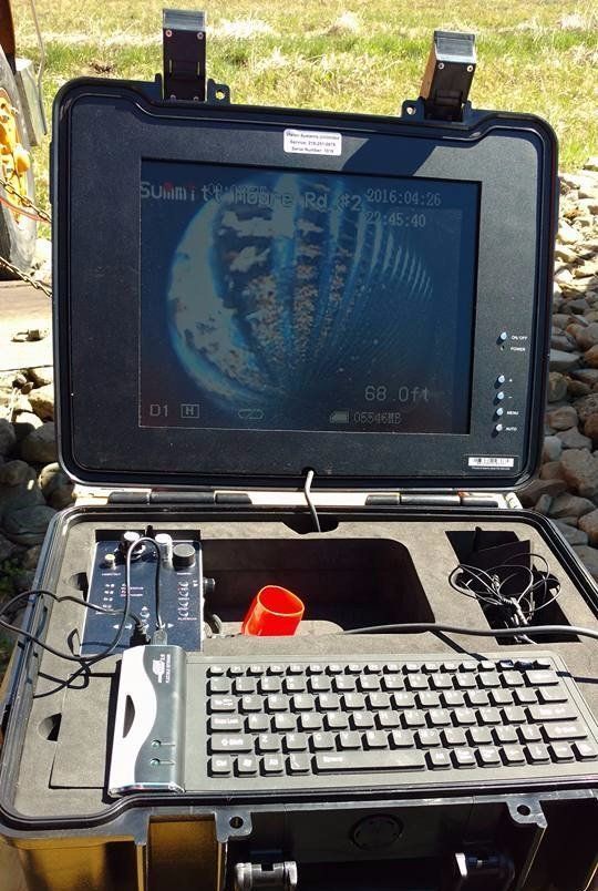 a black case with a monitor that says summit on it