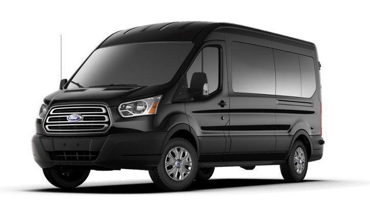 Black Ford Transit passenger van.