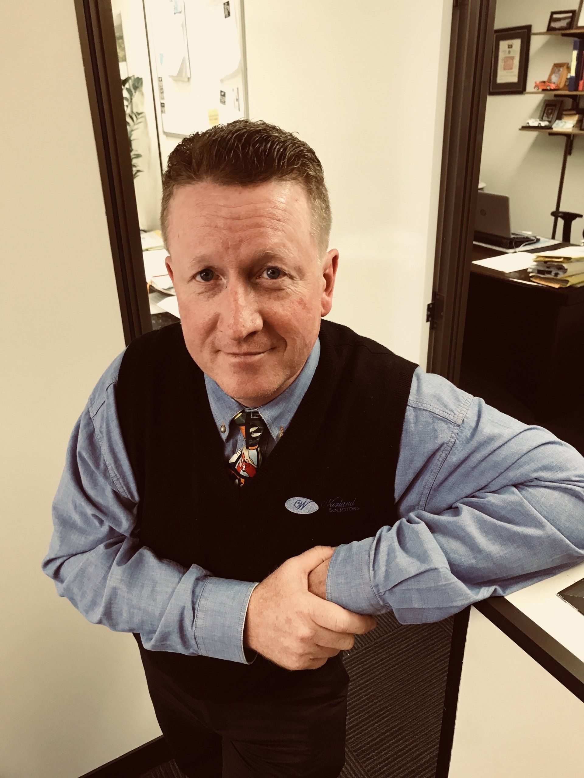 Mike at the Office — Warland Solicitors in Cardiff, NSW