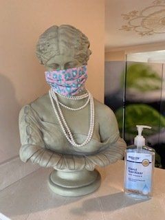 Statue with Face Mask and Alcohol | Keene, NH | Devine Back & Body Care Statue with Face Mask and Alcohol | Keene, NH | Devine Back & Body Care