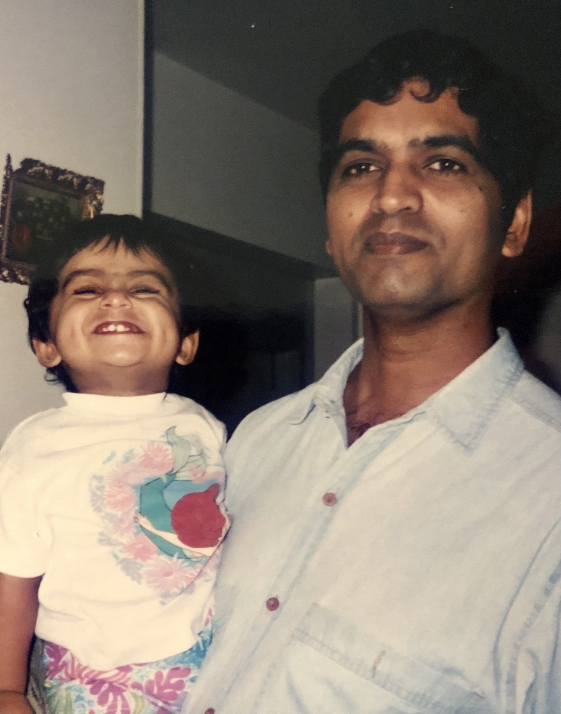 Lahmea, aged two, with her father.