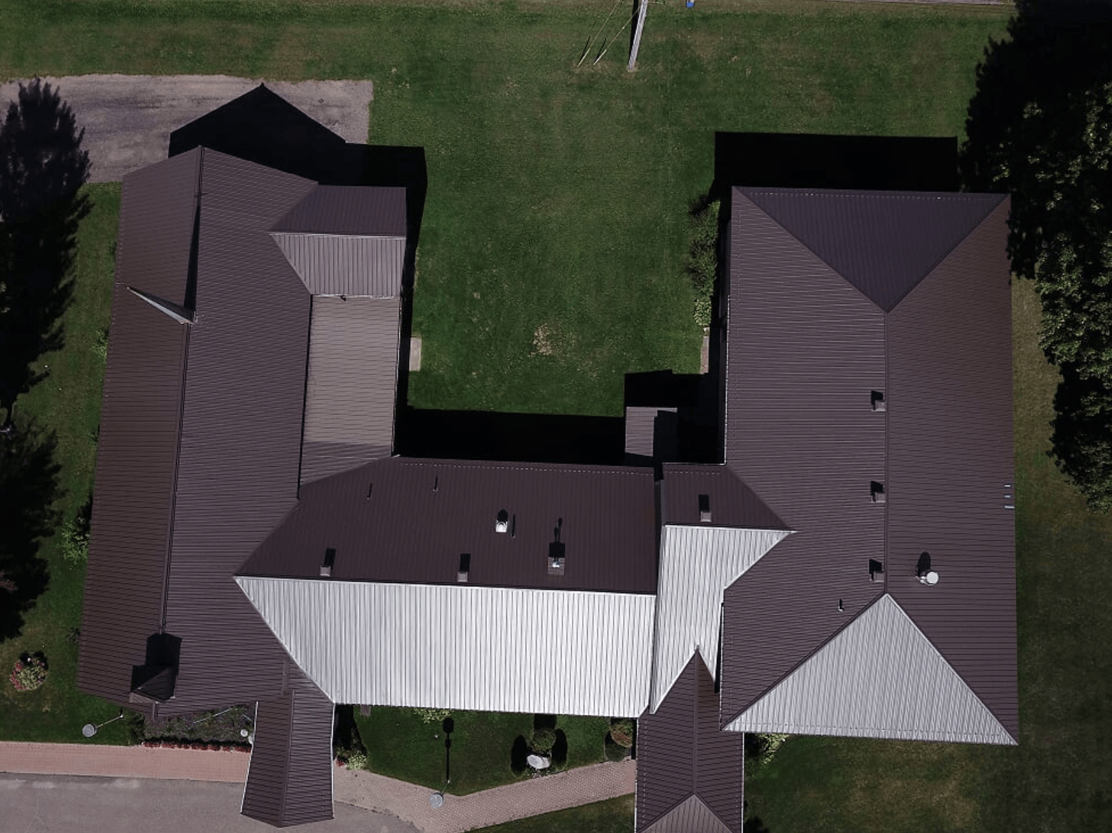 birds eye view of black cross hipped roof