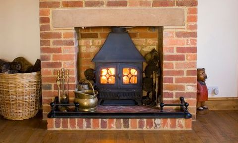 fireplace with brick surround