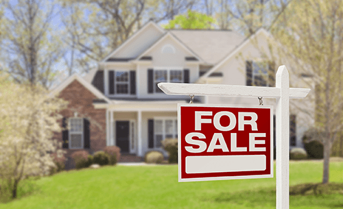 House with for sale sign