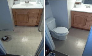 Bathroom renovation progress: old linoleum flooring being replaced. Toilet and vanity in the room.