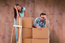 Man and Woman with Cardboard Boxes — Fort Collins, CO — Rocky Mountain Box Co