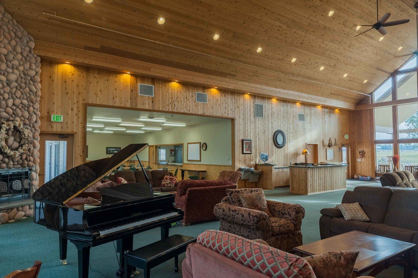 There is a piano in the middle of the room.