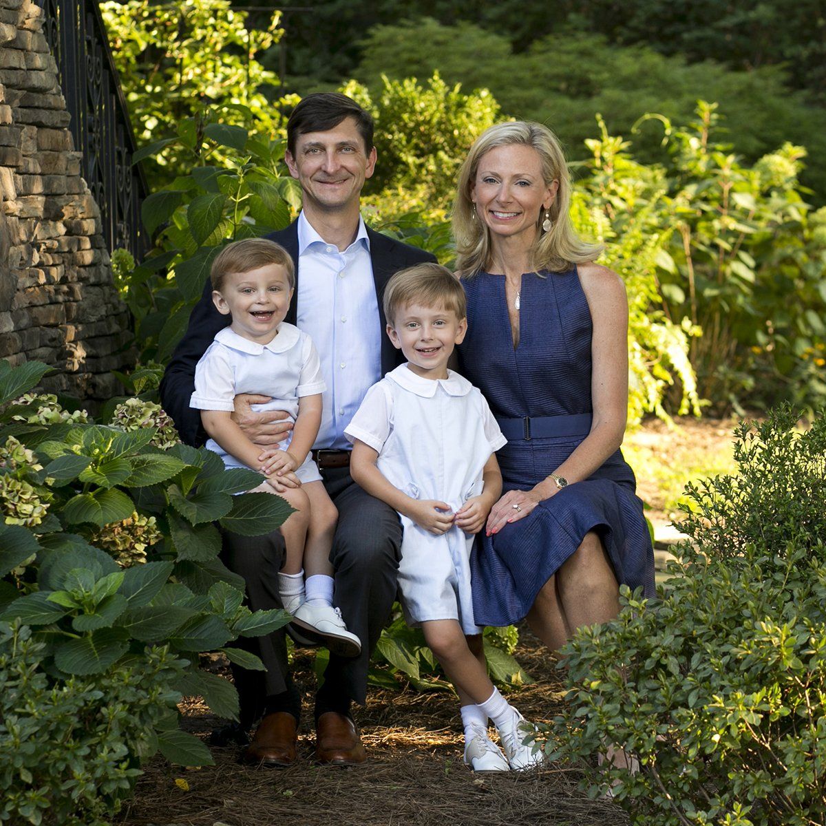 Outdoor family portrait in garden