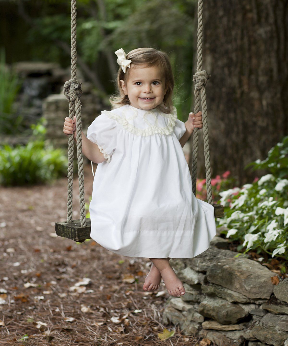 Girl on swing photographed by Scott Ellis
