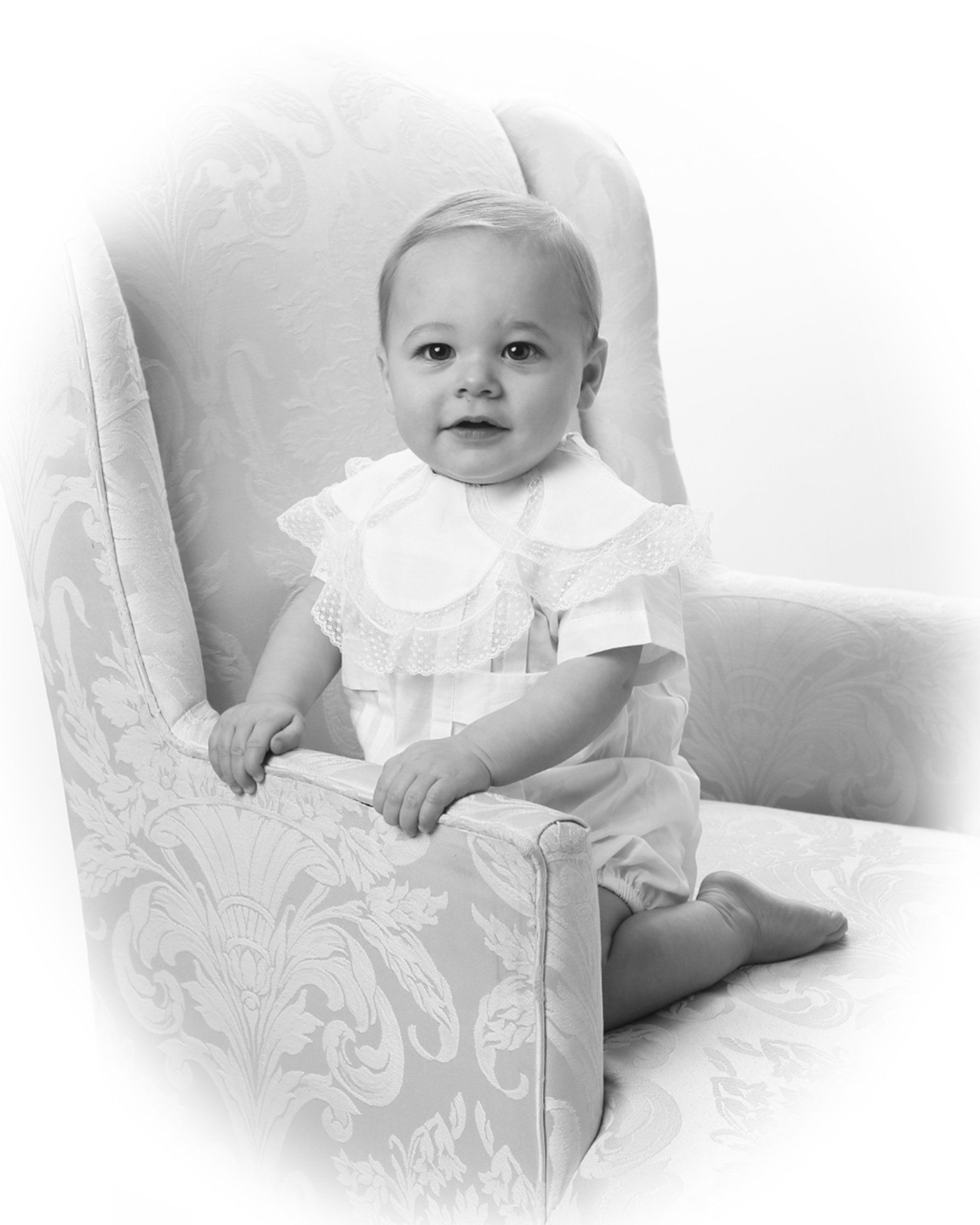 Vintage baby photo sitting in chair