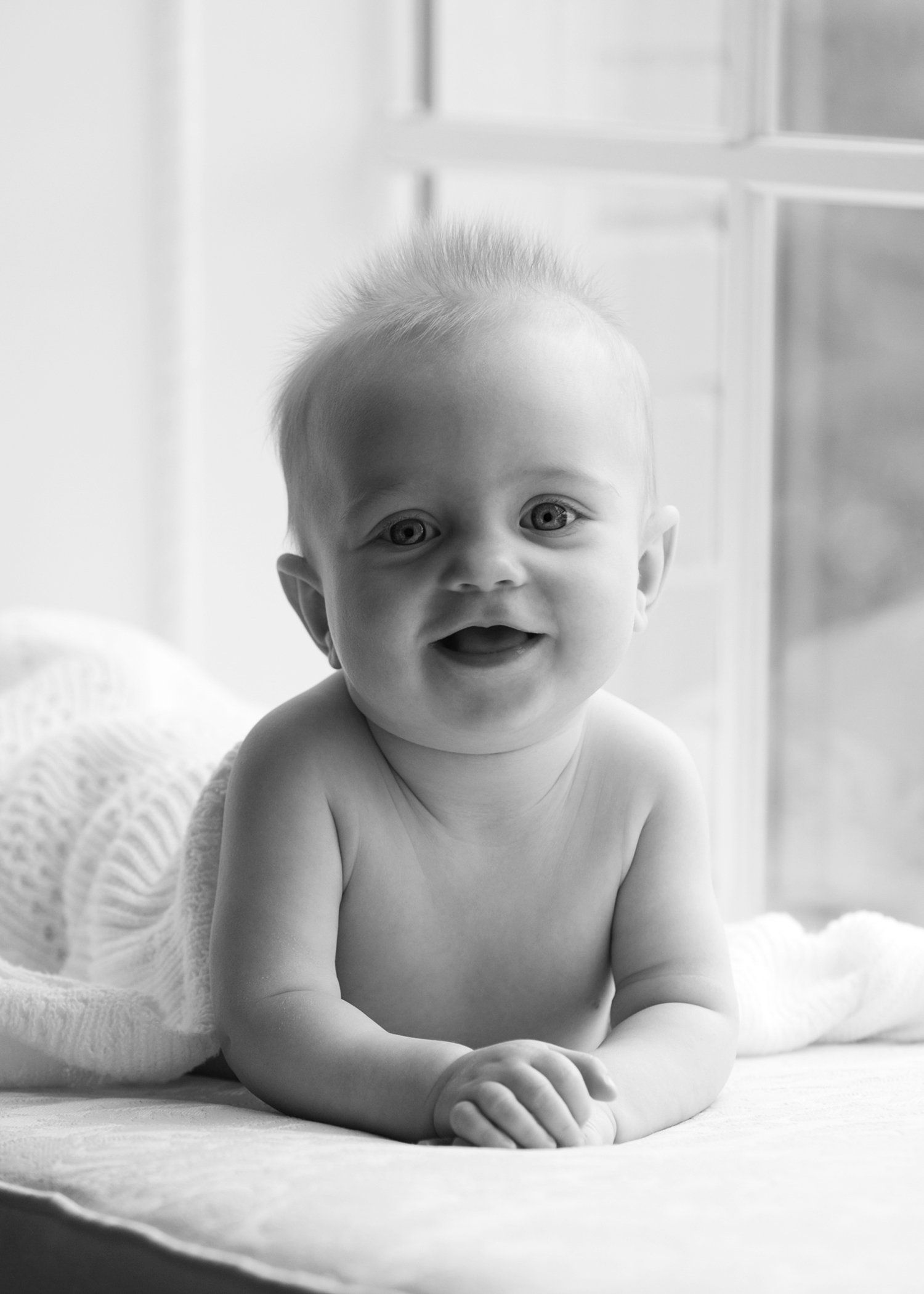 Black and white photo of baby boy by Nashville photographer