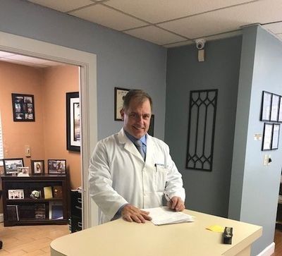 Podiatrist — Doctor Talking To Patient in Pompano Beach, FL Podiatrist — Doctor Talking To Patient in Pompano Beach, FL