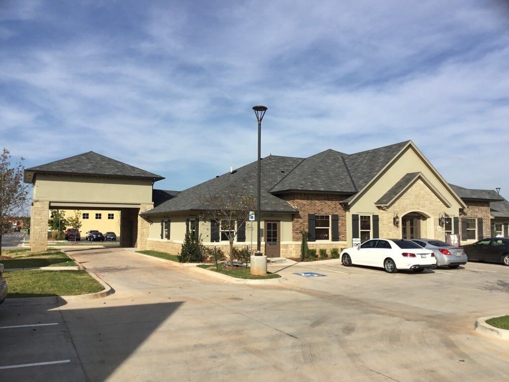 Brick Repair — Subdivision Houses with Brick Wall in Oklahoma City, OK