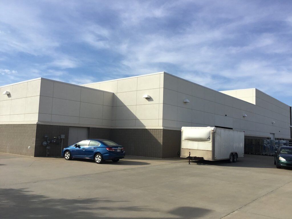 Stucco — White Building with Blue Car in Oklahoma City, OK