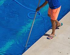Vacation Home Pool Service — Cleaning Pool Floor in South Lake Tahoe, CA Vacation Home Pool Service — Cleaning Pool Floor in South Lake Tahoe, CA