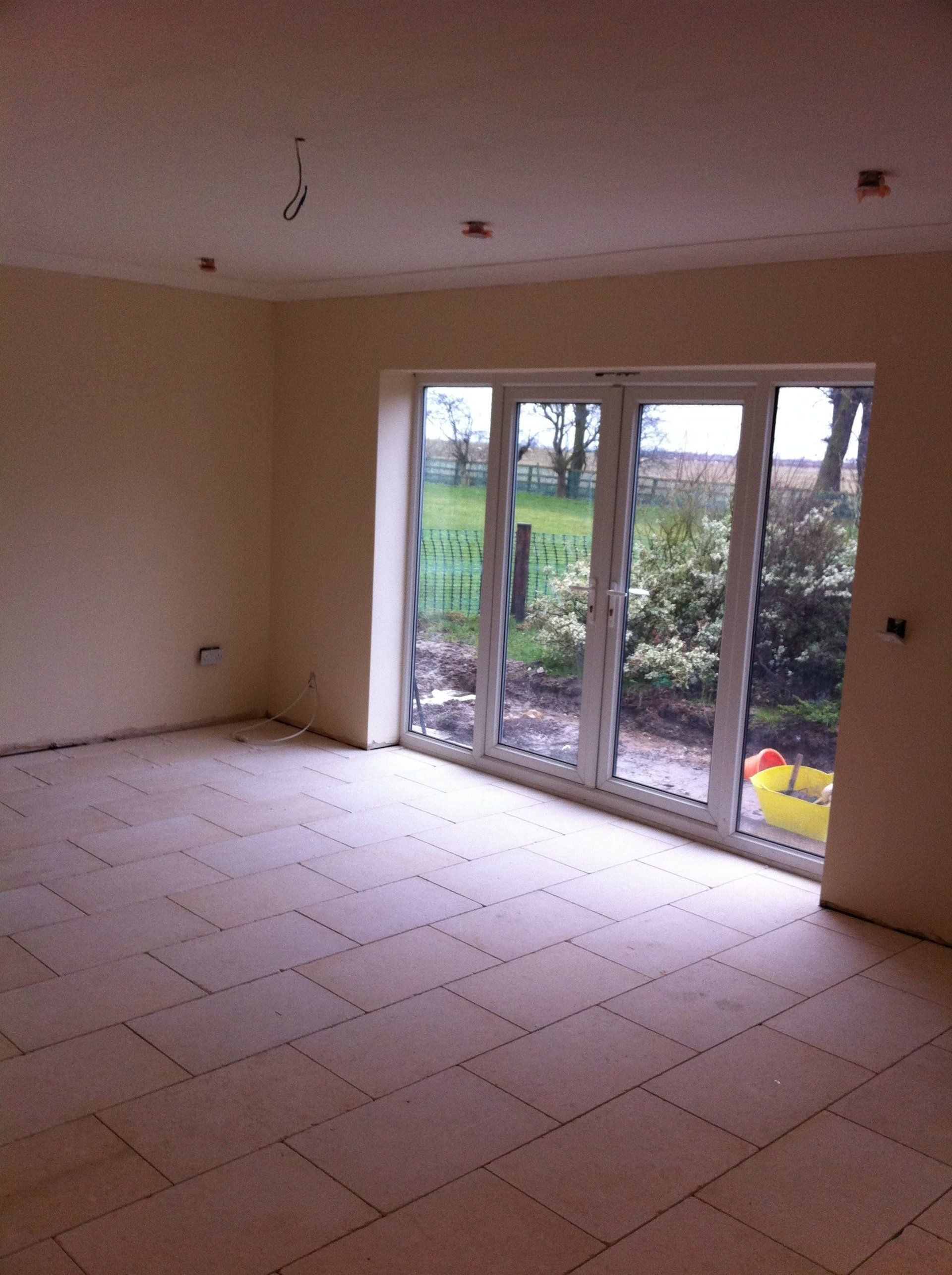 Limestone Tiling to Games Room