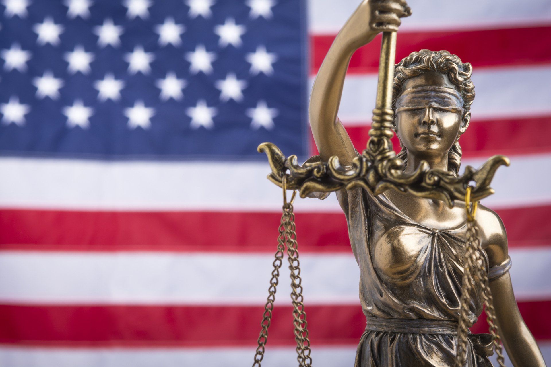 Lady Justice in American Flag | Clarksville, TN | Edmondson Bonding Co