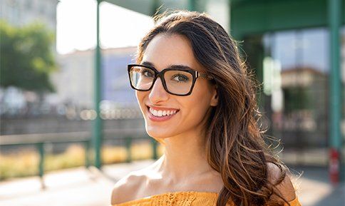 Smiling Woman Wearing Eyeglasses — Washington, PA — Snee Dental Associates Smiling Woman Wearing Eyeglasses — Washington, PA — Snee Dental Associates