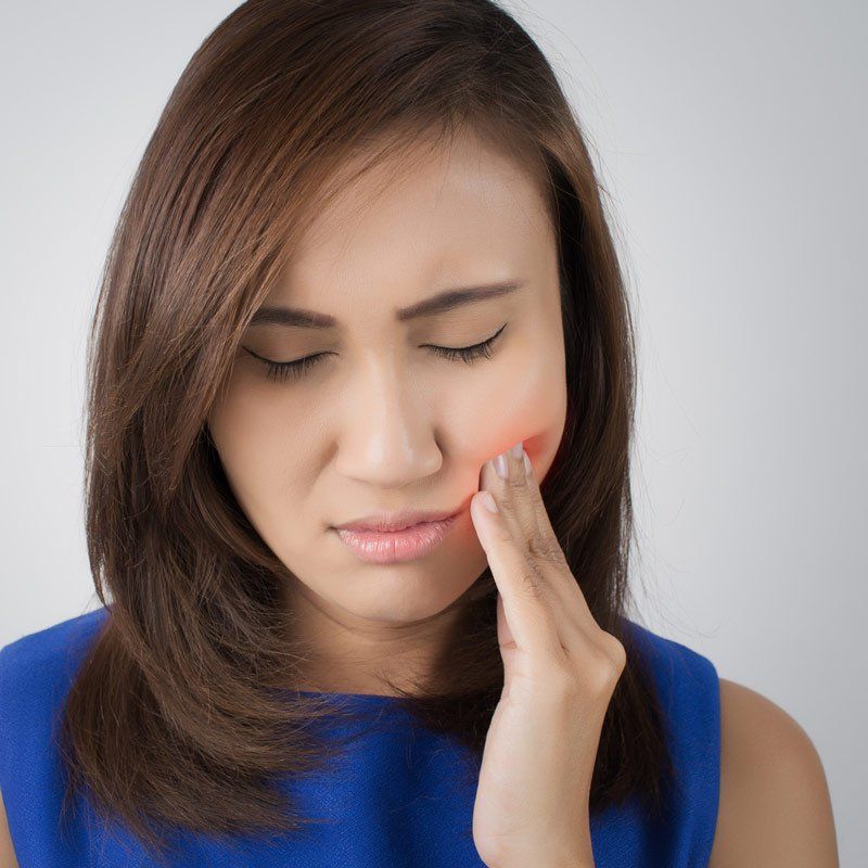 woman with sore gums