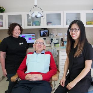 dentist talking to patient