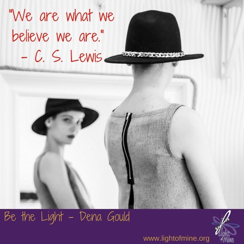 a woman in a stylish hat looking in the mirror