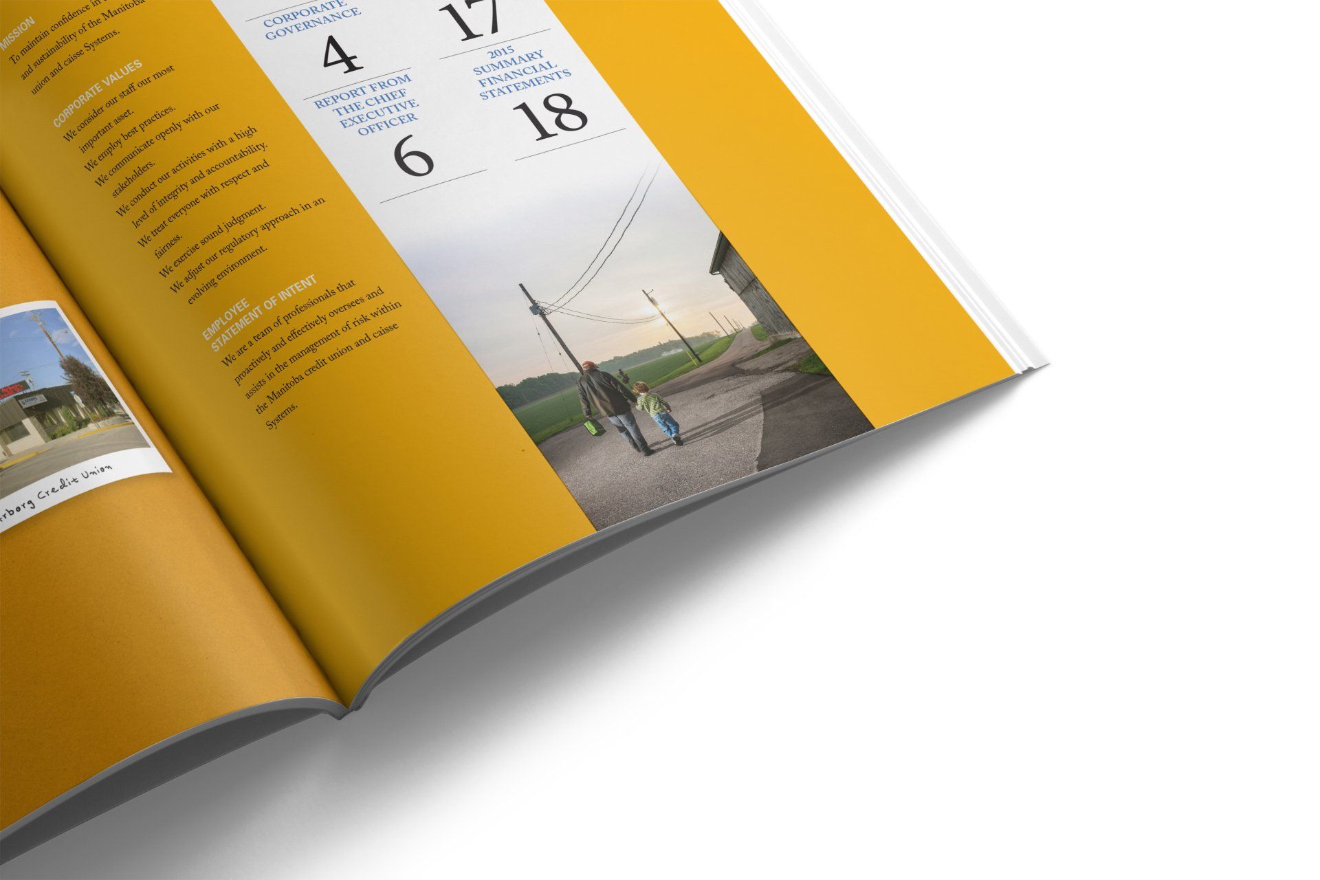 Open magazine with yellow accents, featuring text, numbers, and a photo of people walking down a path.