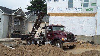 Truck Loading Woods - Dumpster Rental in Collegeville, PA Truck Loading Woods - Dumpster Rental in Collegeville, PA