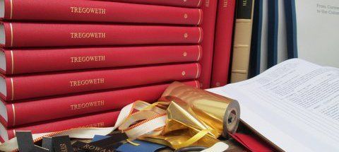Girl reading books supplied by a bookbinding company in Auckland
