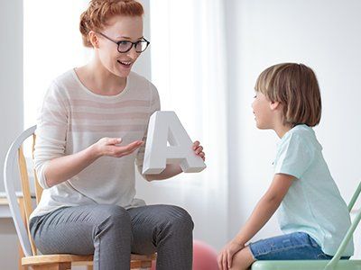 Occupational Therapy — Speech Therapist During Private Lesson in Flint Township, MI