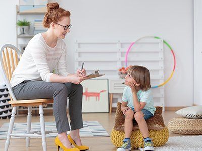 Speech Therapy — Psychologist Talking with Little Boy in Flint Township, MI Speech Therapy — Psychologist Talking with Little Boy in Flint Township, MI