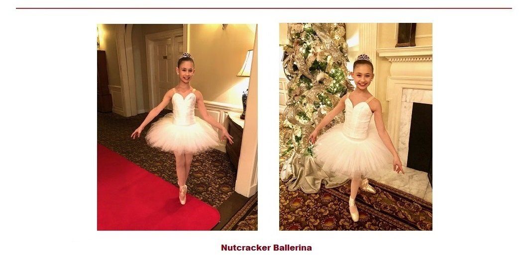 A little girl in a white tutu is standing on a red carpet.