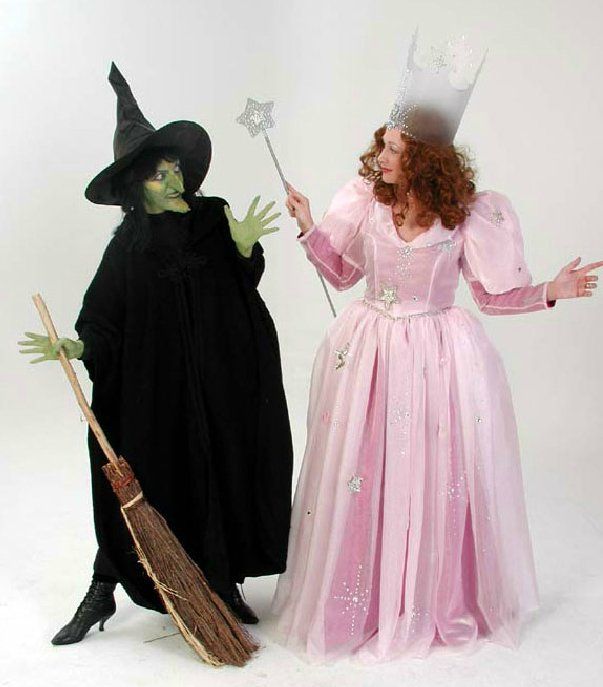 A witch and a wizard are standing next to each other