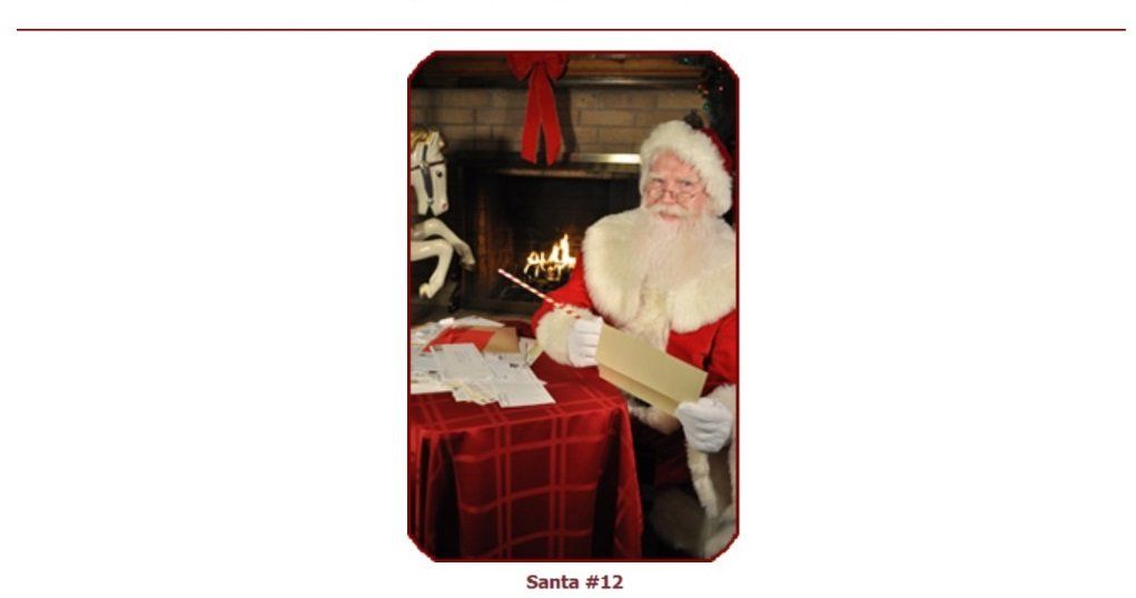 A picture of santa claus sitting at a table in front of a fireplace