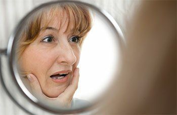 woman missing a tooth