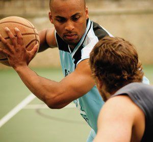 men playing basketball
