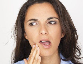 woman with tooth pain